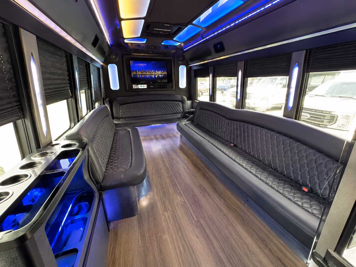 Group beside a Mercedes Sprinter limo in Chesapeake